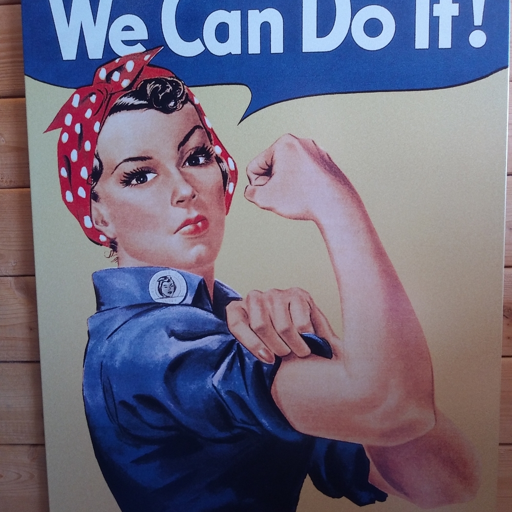 Iconic Rosie the Riveter metal sign